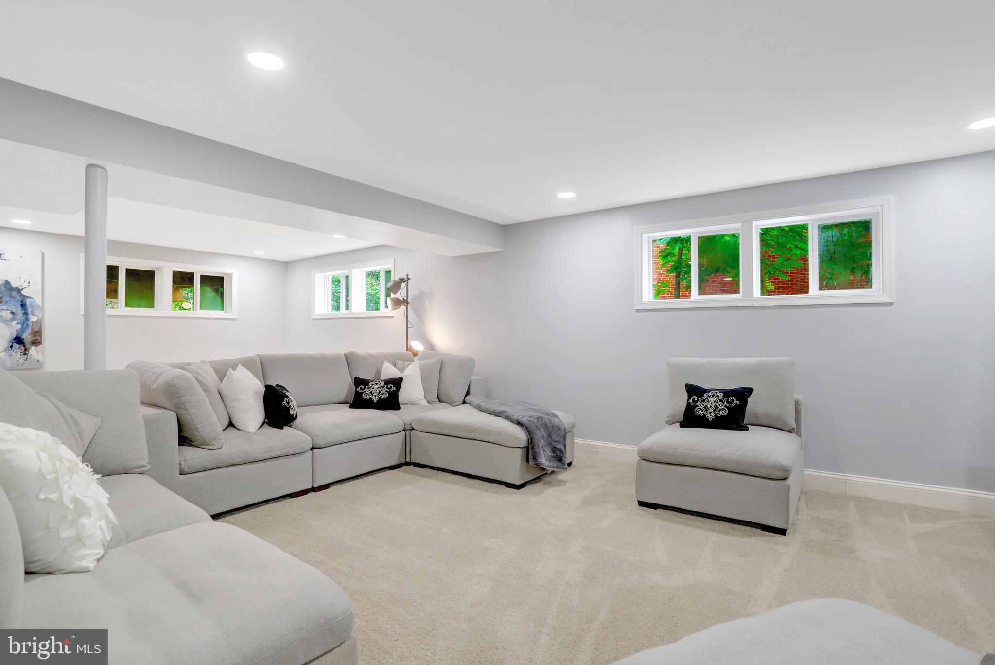 5418 Inverchapel Road Springfield, VA 22151 - Photo 38 of 94 a living room with furniture and windows