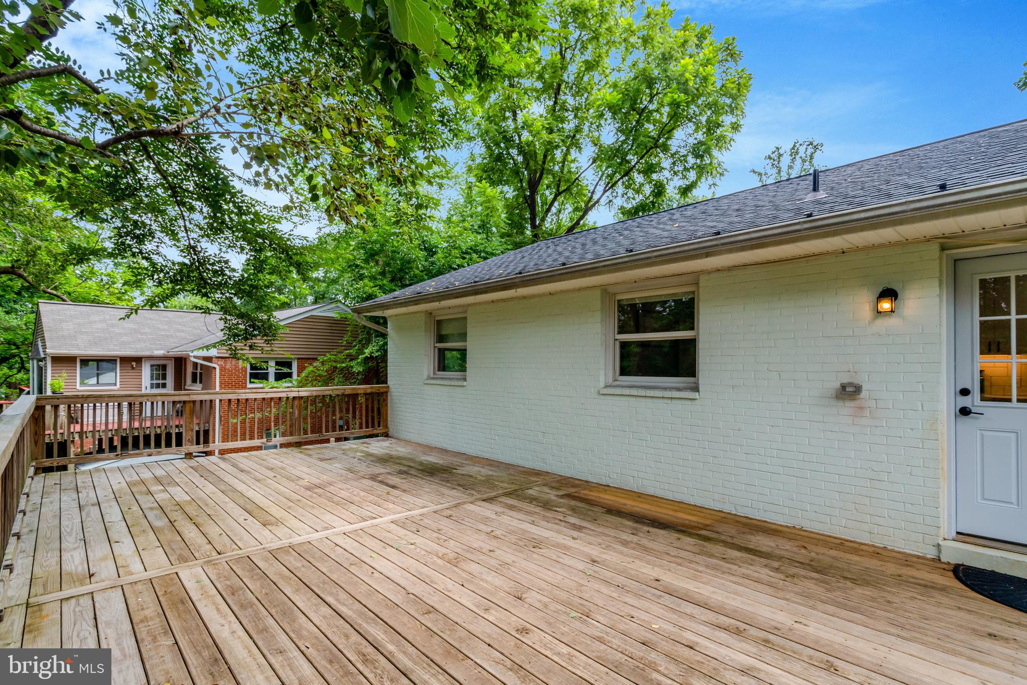 5418 Inverchapel Road Springfield, VA 22151 - Photo 62 of 94 a view of house with deck and wooden floor