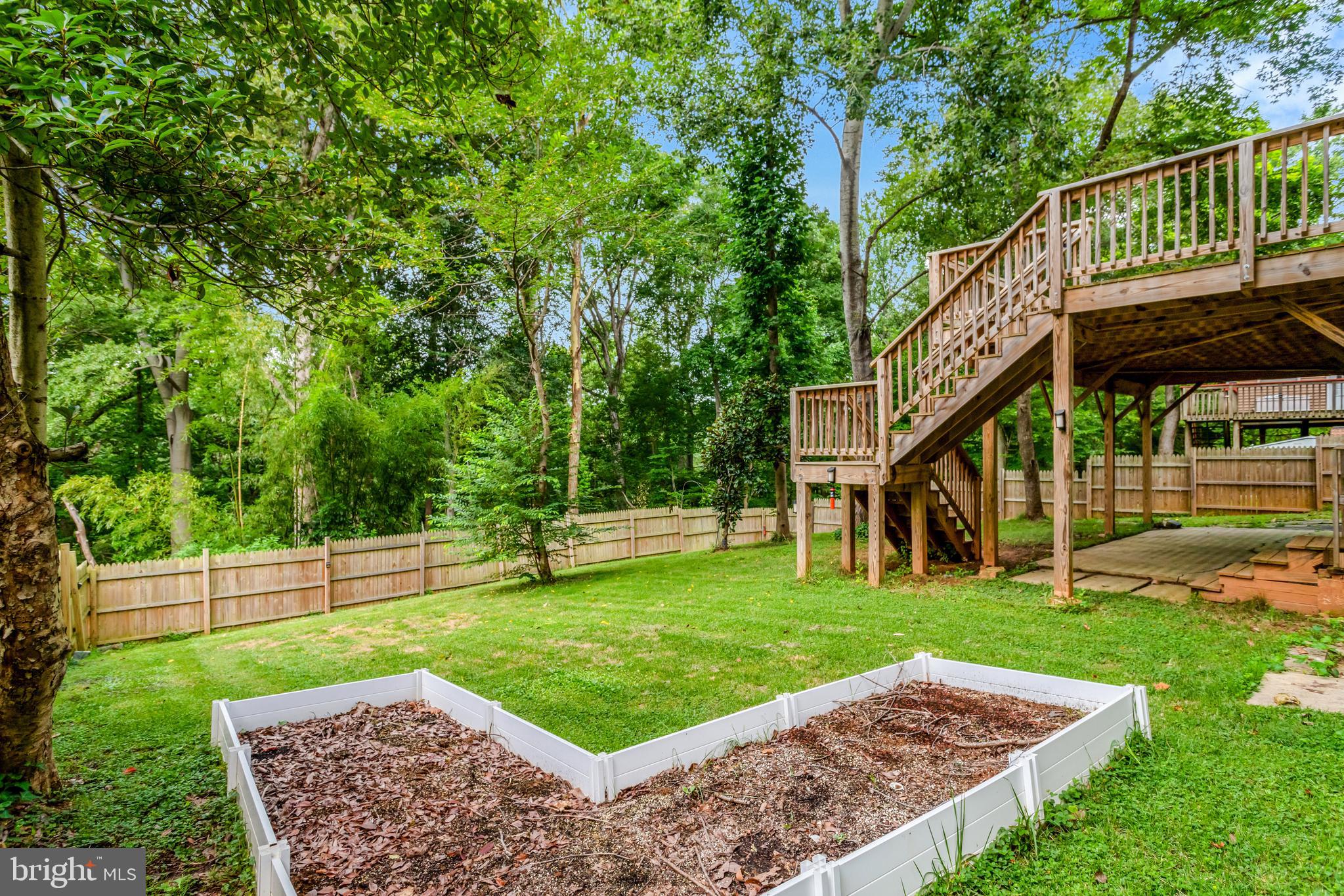 5418 Inverchapel Road Springfield, VA 22151 - Photo 70 of 94 a view of a house with backyard and a hammock