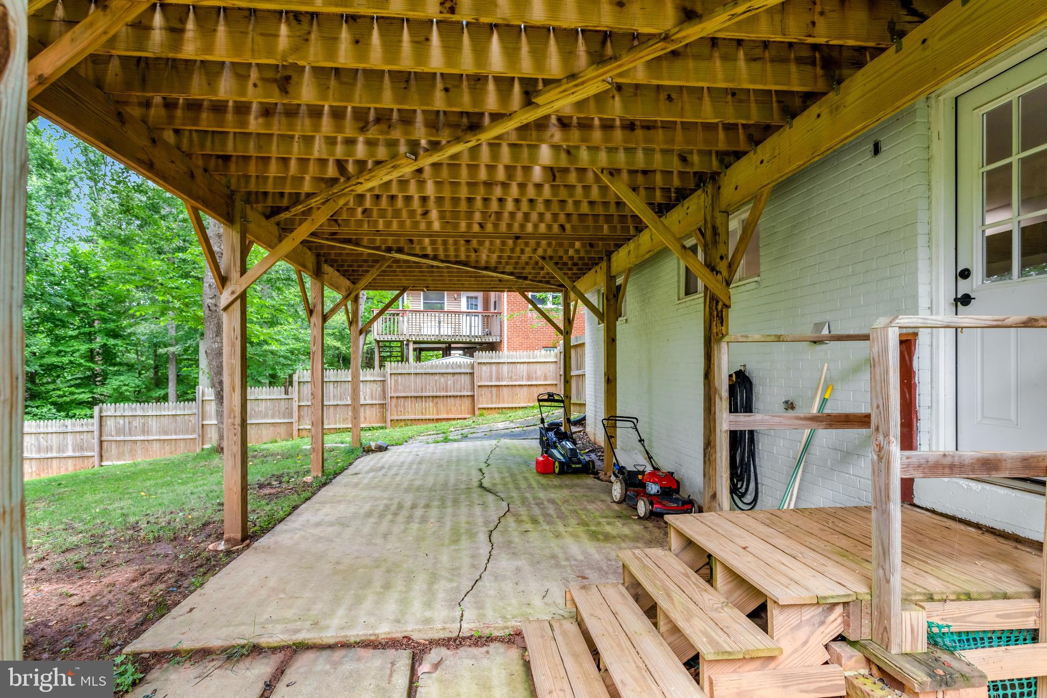5418 Inverchapel Road Springfield, VA 22151 - Photo 71 of 94 a view of a backyard with wooden floor and roof