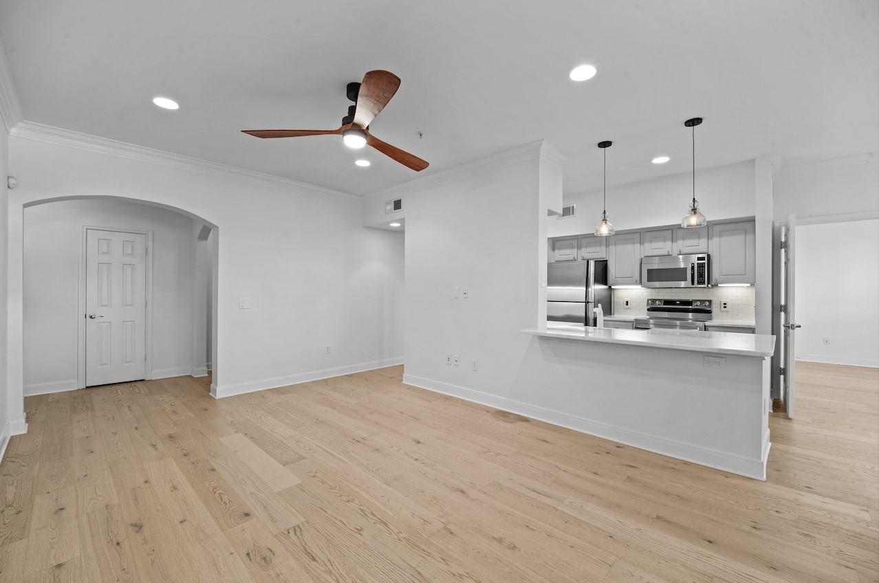 7701 Rialto Boulevard, Unit 1412 Austin, TX 78735 - Photo 1 of 30 a view of kitchen with refrigerator microwave and stove