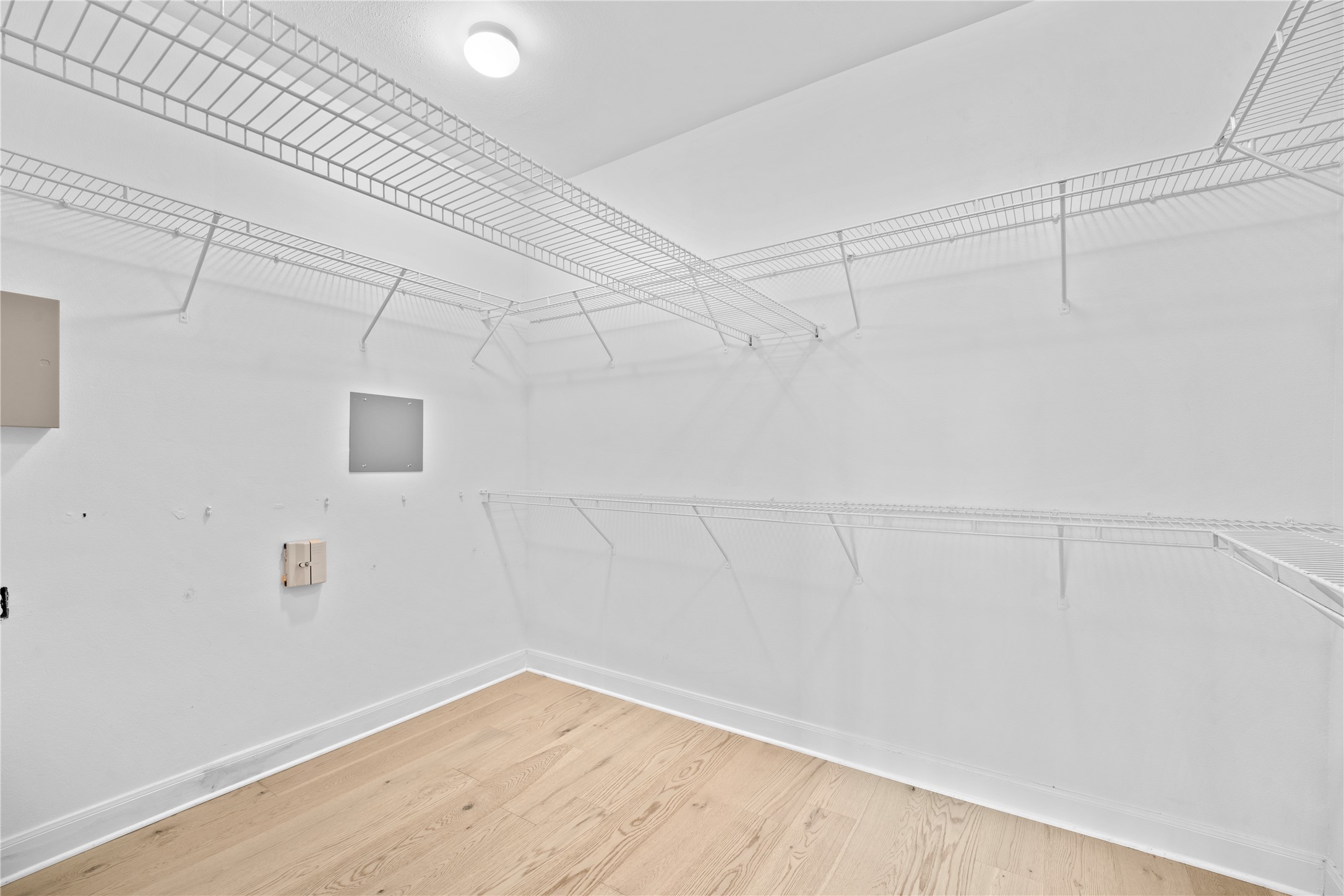 7701 Rialto Boulevard, Unit 1412 Austin, TX 78735 - Photo 18 of 30 a view of a room with racks on the wall