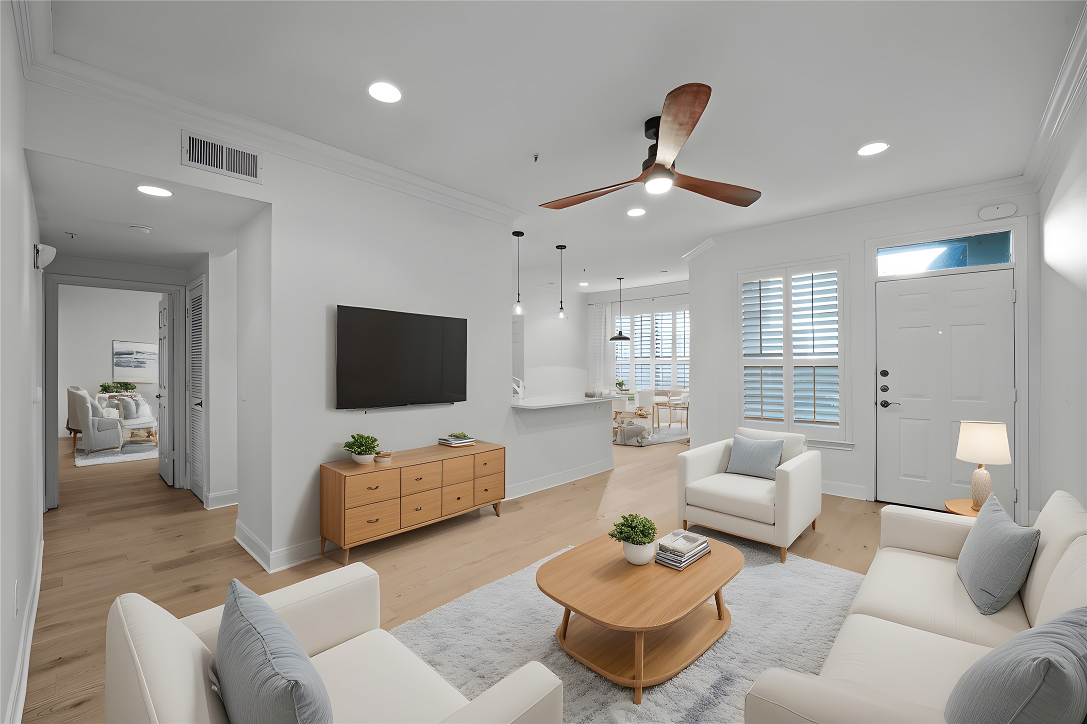 7701 Rialto Boulevard, Unit 1412 Austin, TX 78735 - Photo 6 of 30 a living room with furniture and a flat screen tv