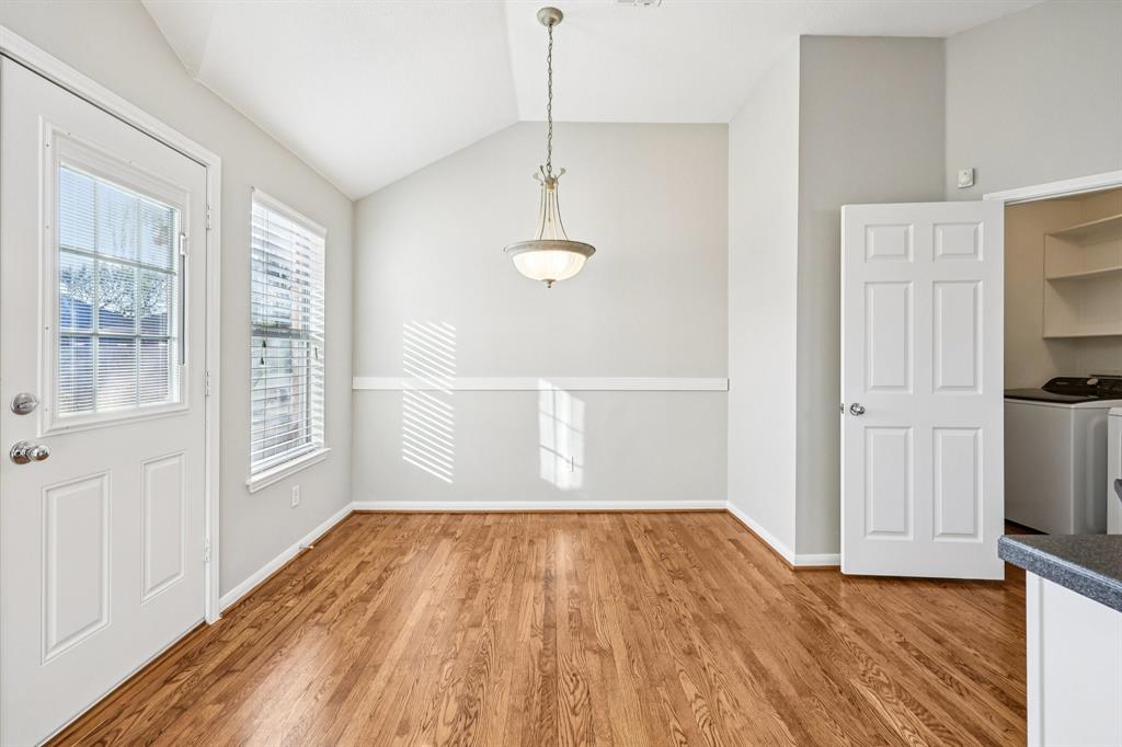 7313 San Carlos Drive Rowlett, TX 75089 - Photo 16 of 40 a view of empty room with wooden floor and fan