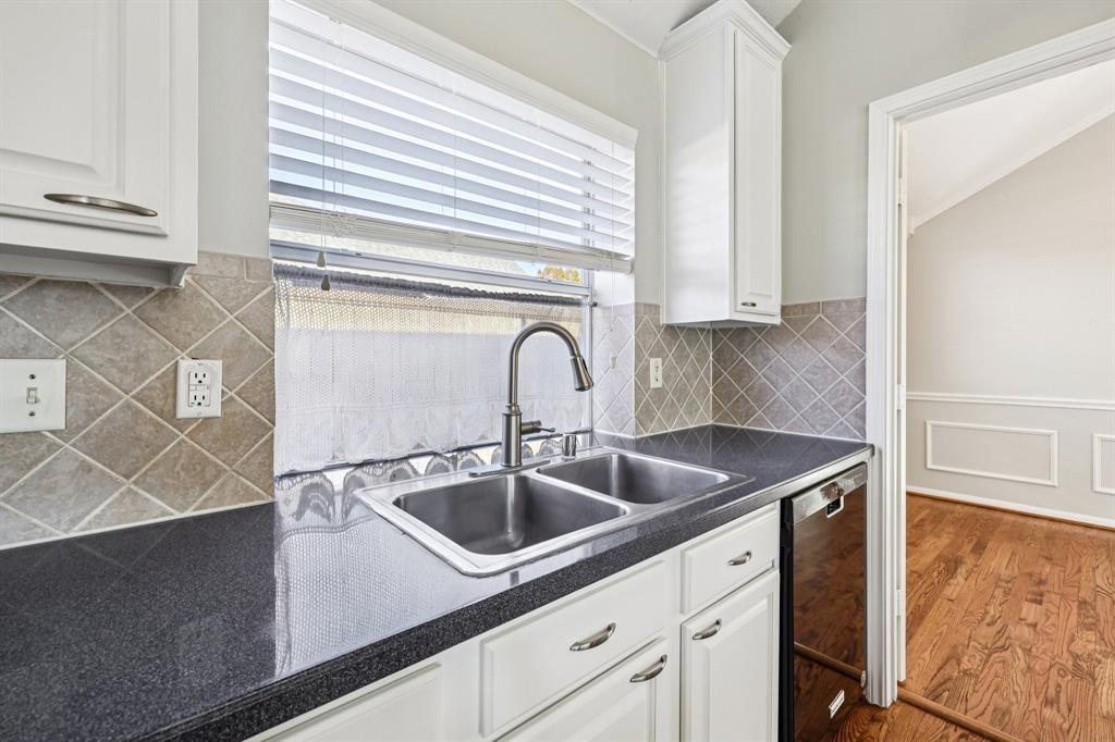 7313 San Carlos Drive Rowlett, TX 75089 - Photo 18 of 40 a close view of sink and tap