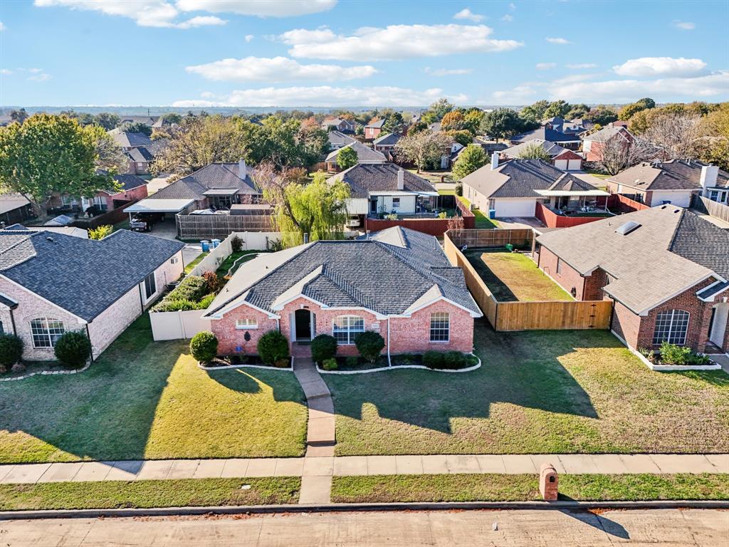 7313 San Carlos Drive Rowlett, TX 75089 - Photo 38 of 40 a view of multiple houses with yard