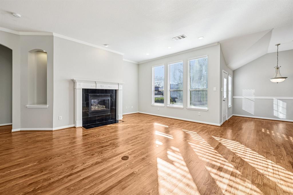 7313 San Carlos Drive Rowlett, TX 75089 - Photo 9 of 40 a view of an empty room with window and fire place