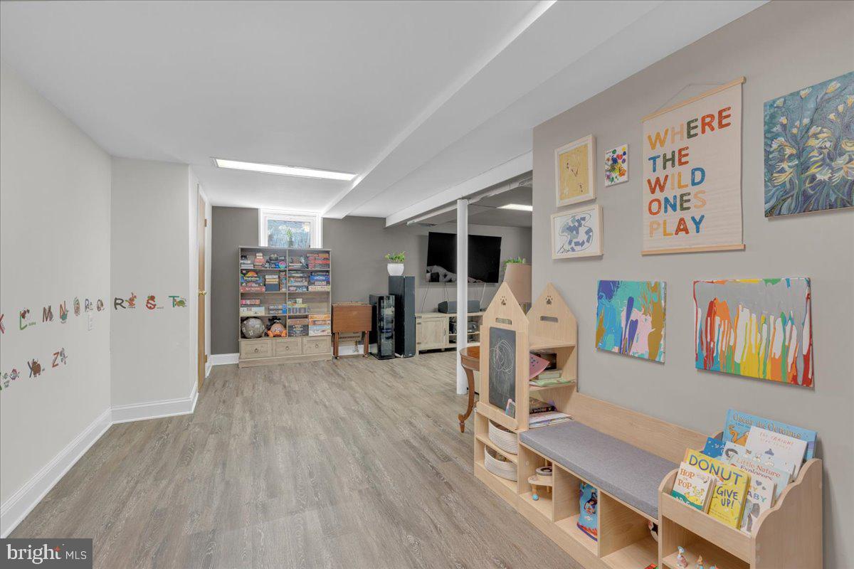 166 Sproul Road Malvern, PA 19355 - Photo 17 of 20 a living room with furniture and wooden floor