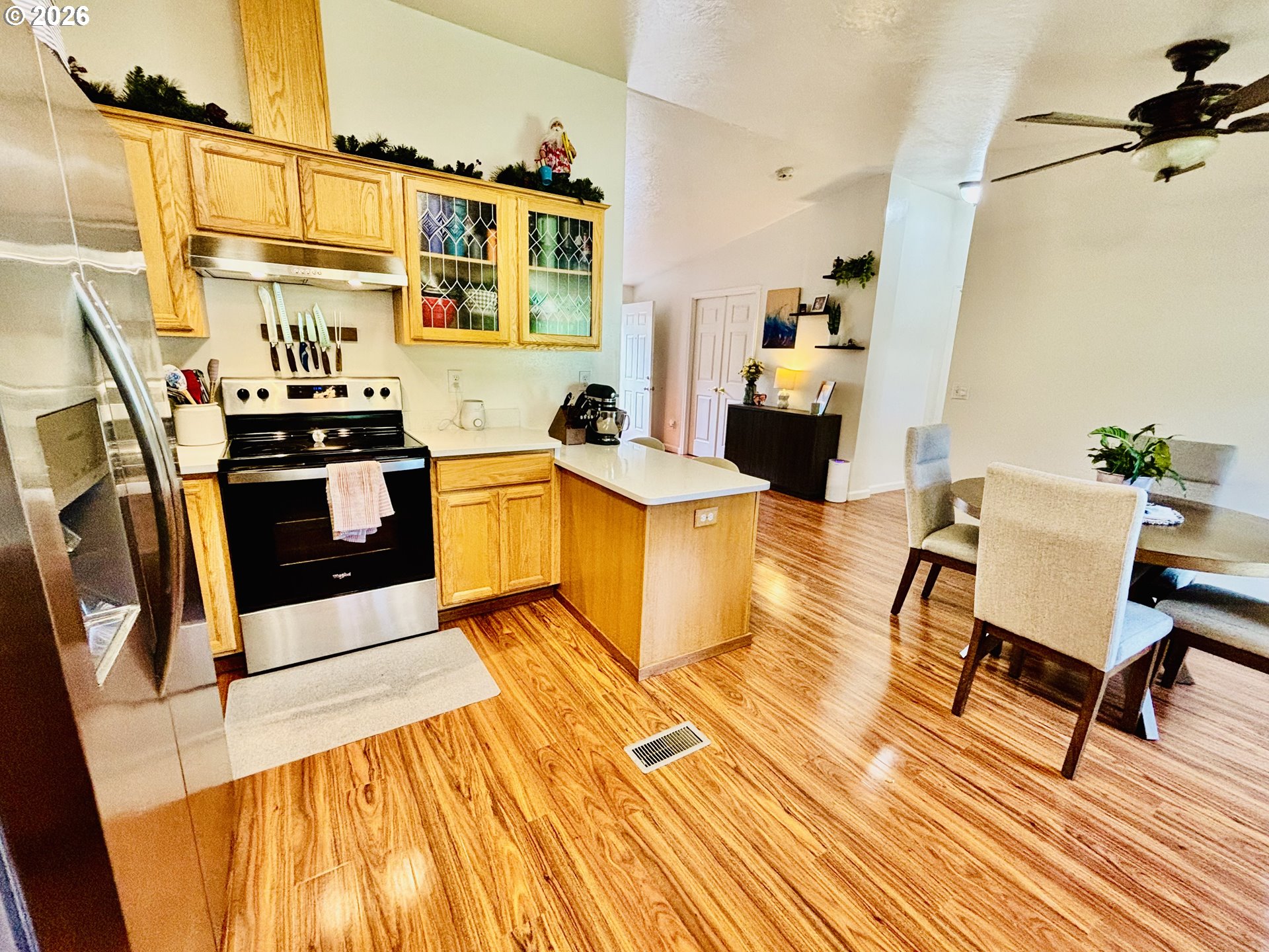 98190 Gavin Lane Brookings, OR 97415 - Photo 11 of 37 a living room with stainless steel appliances furniture and a rug