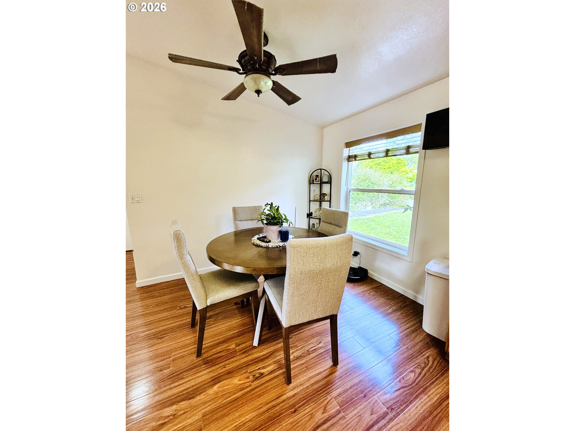 98190 Gavin Lane Brookings, OR 97415 - Photo 12 of 37 a view of a dining room with a table and chairs