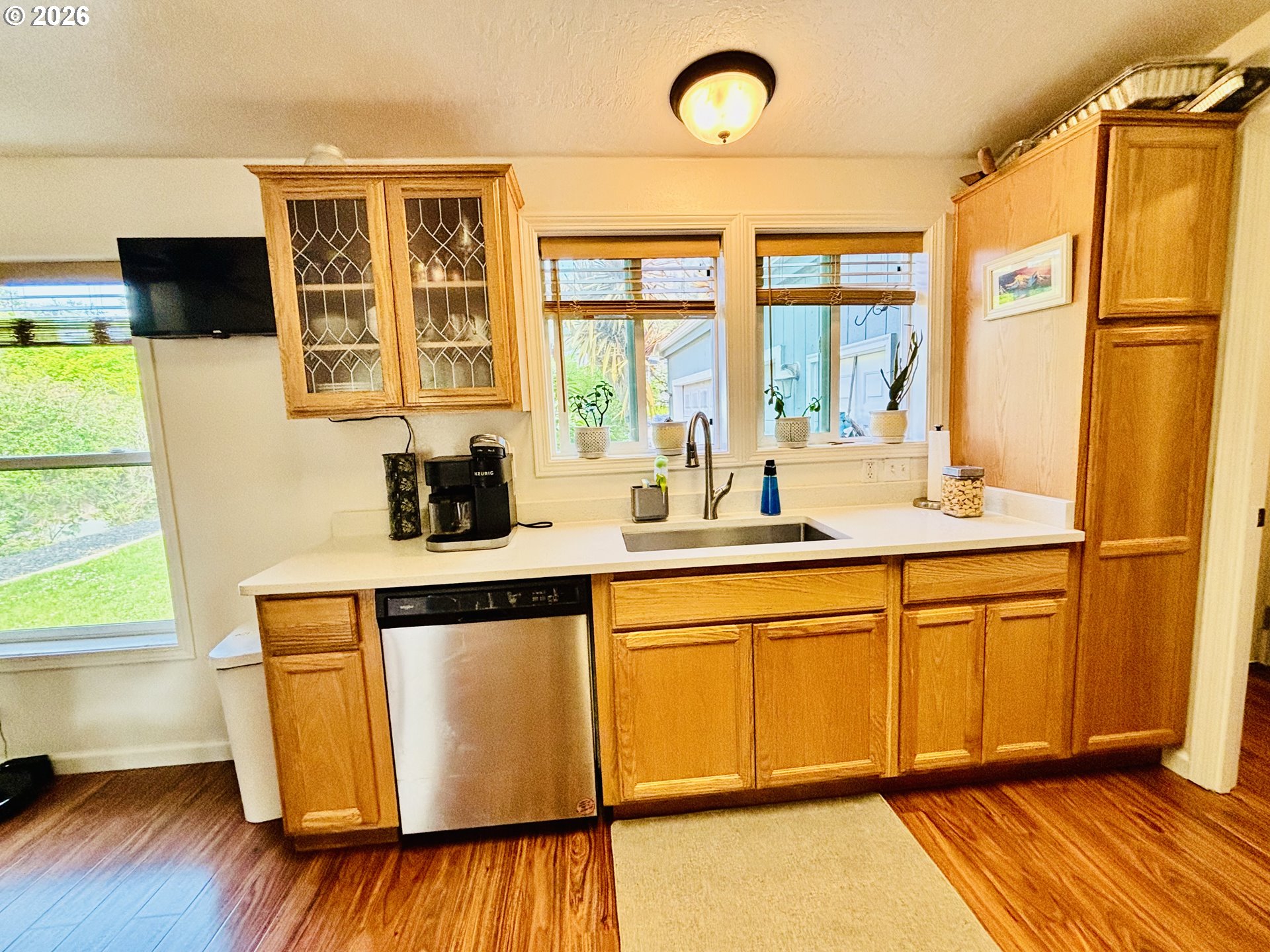 98190 Gavin Lane Brookings, OR 97415 - Photo 14 of 37 a kitchen with stainless steel appliances granite countertop a stove a sink and a refrigerator