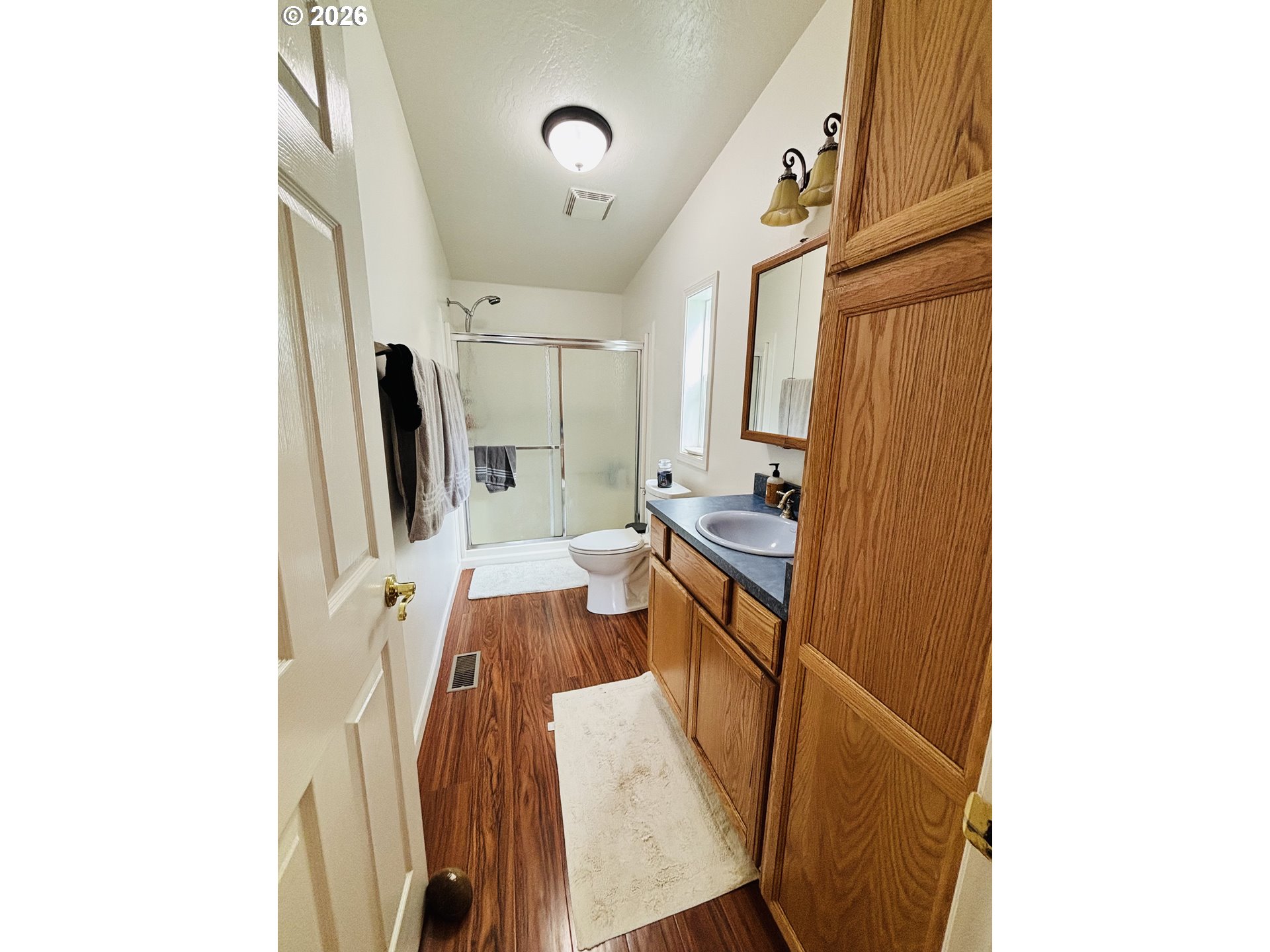 98190 Gavin Lane Brookings, OR 97415 - Photo 20 of 37 a kitchen with stainless steel appliances a refrigerator and a stove