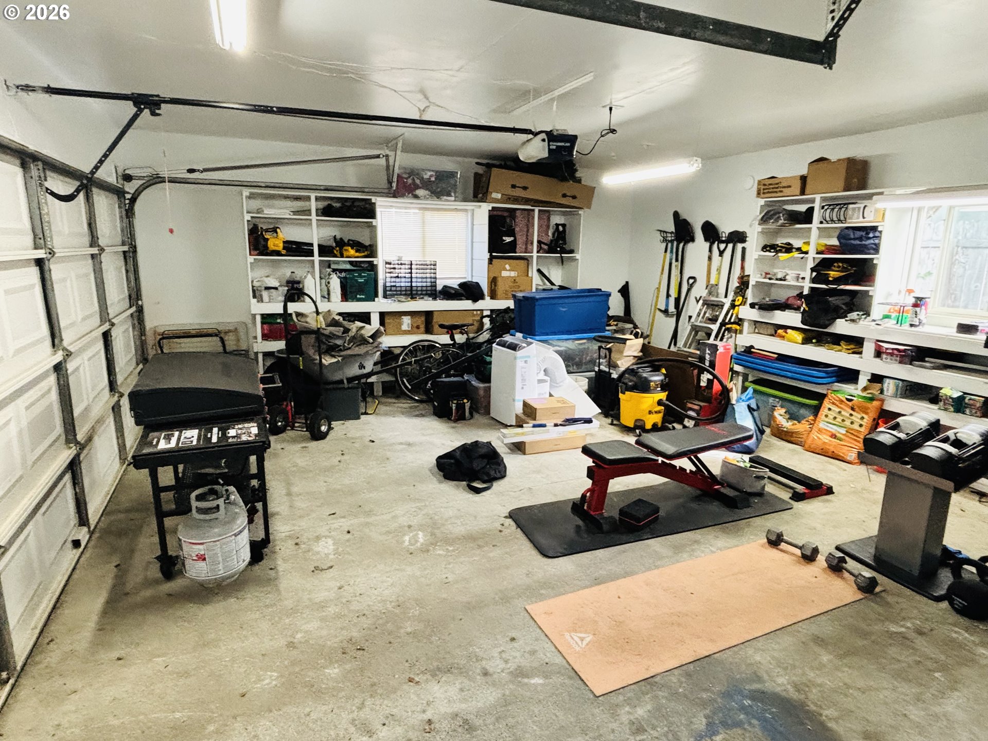 98190 Gavin Lane Brookings, OR 97415 - Photo 26 of 37 a room with lots of chairs and mirrors