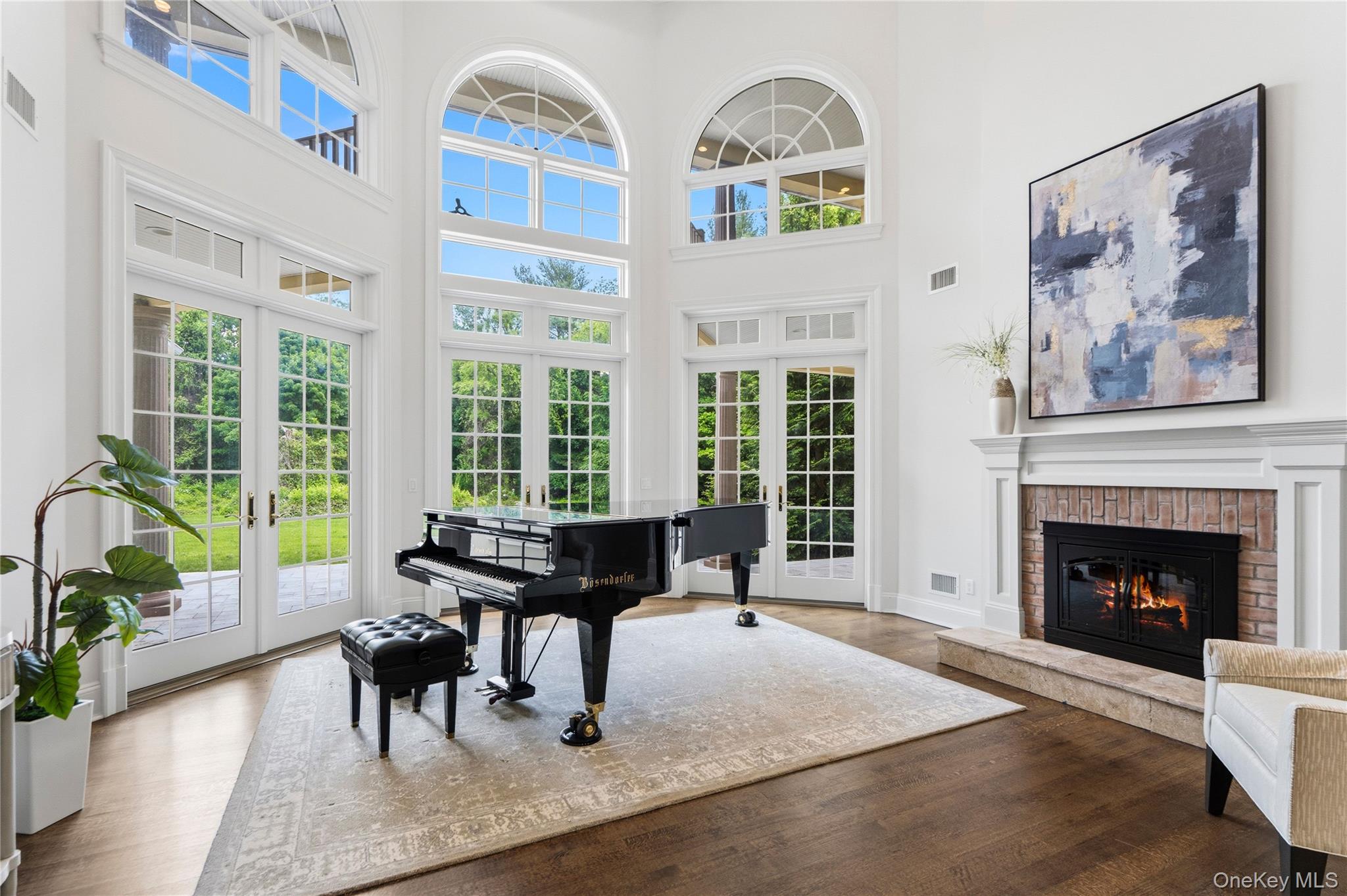 1960 Midlane Road South Syosset, NY 11791 - Photo 5 of 46 a living room with furniture and a fireplace