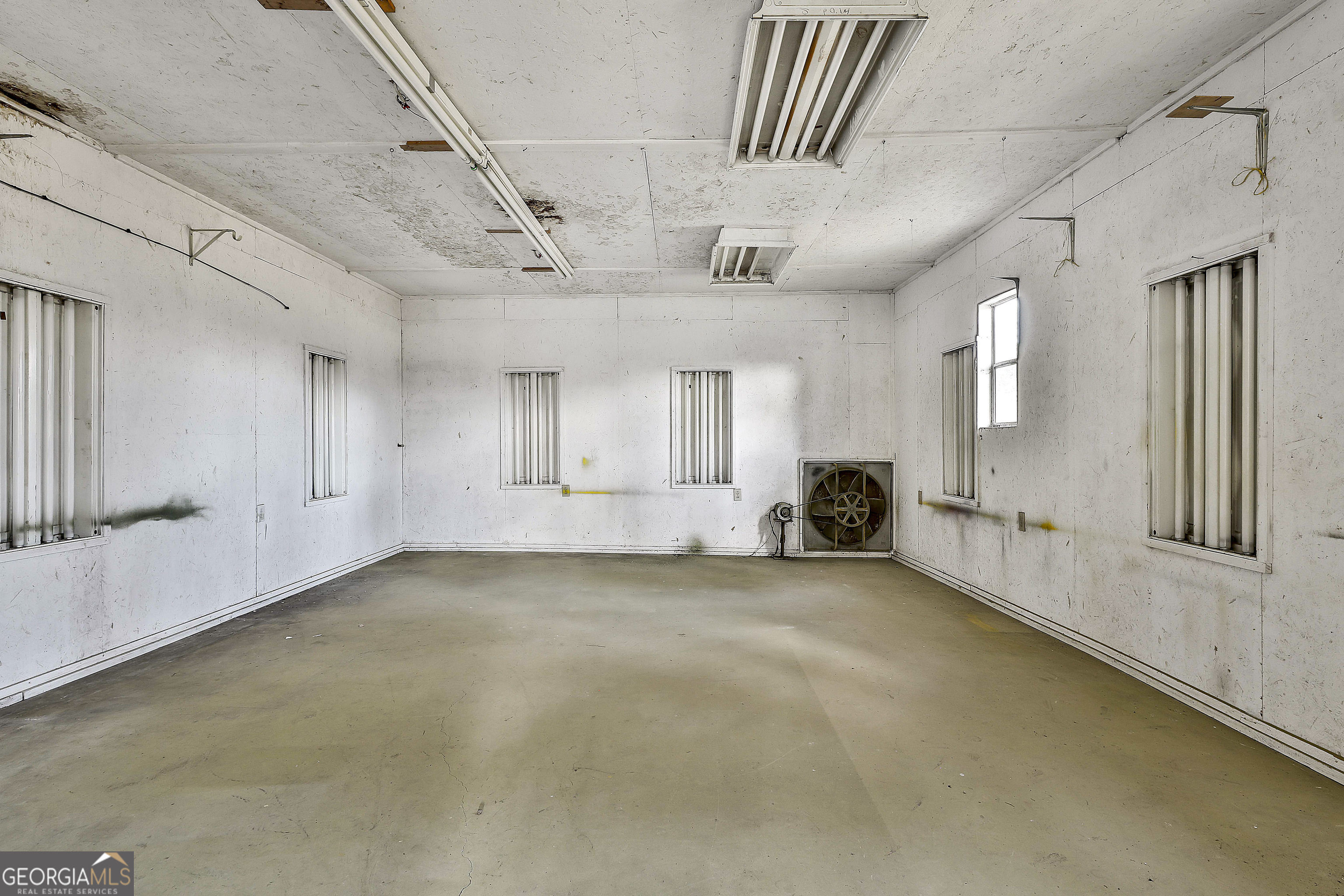 910 Line Creek Road Senoia, GA 30276 - Photo 42 of 56 a view of a livingroom with a staircase