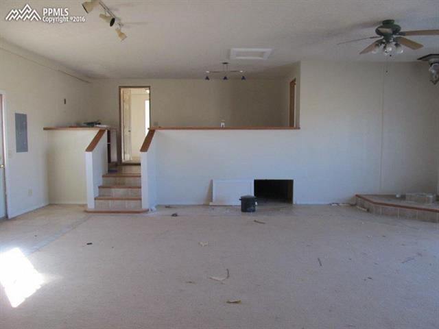 255 South Page Road Colorado Springs, CO 80930 - Photo 7 of 17 A spacious family room.