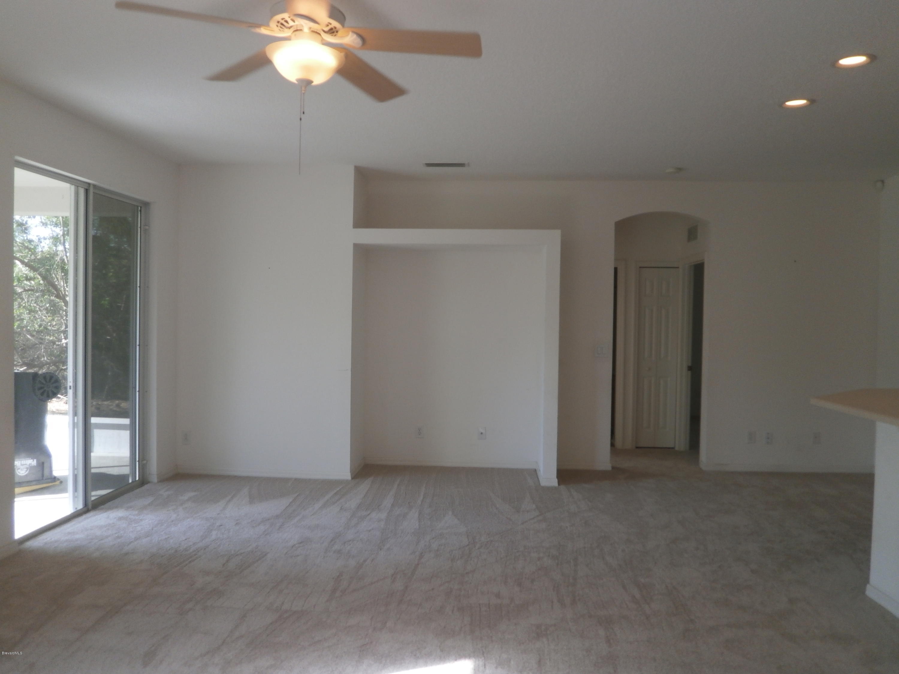 2784 Digby Road Southeast Palm Bay, FL 32909 - Photo 11 of 19 a view of an empty room with a window