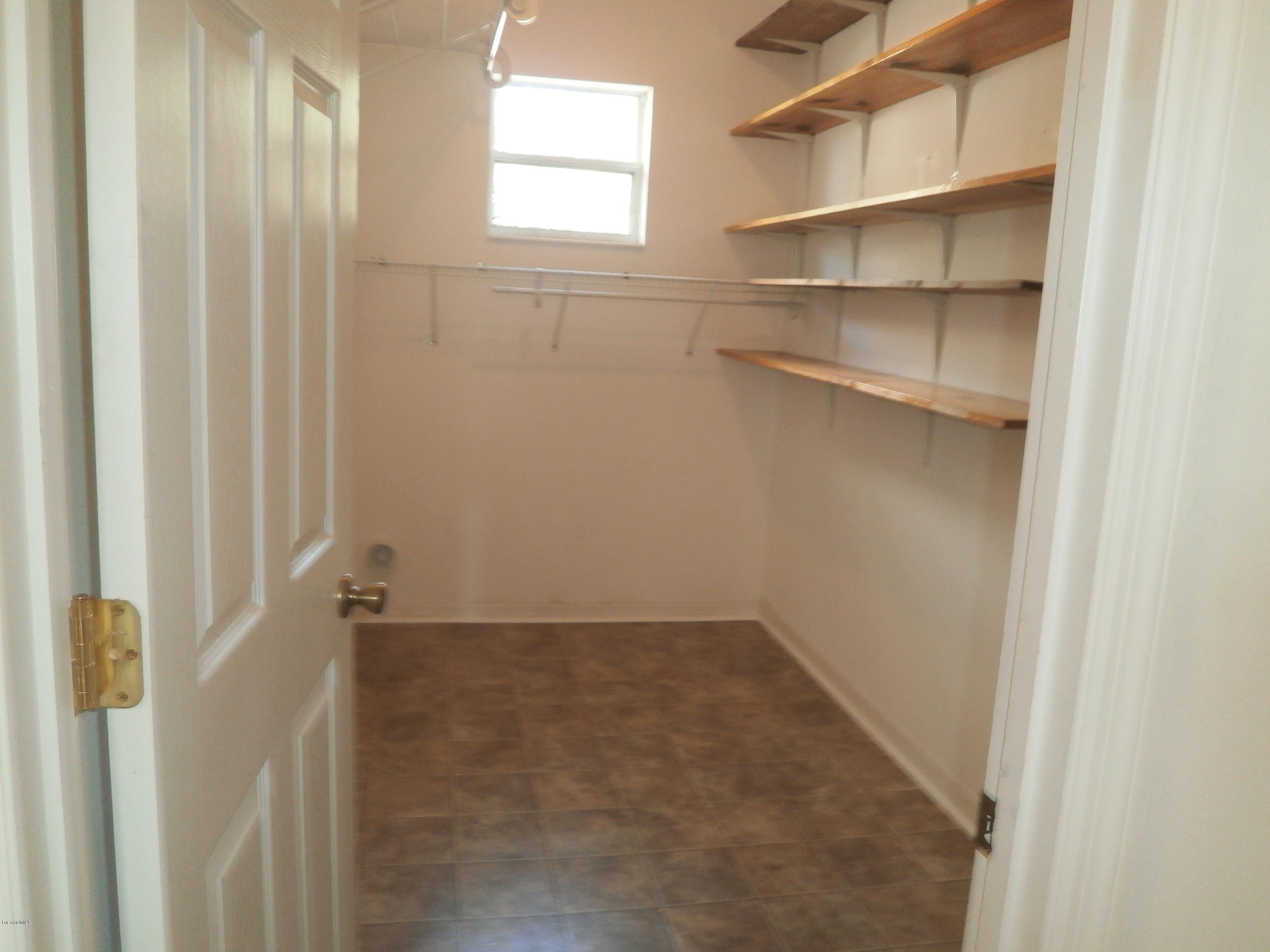 2784 Digby Road Southeast Palm Bay, FL 32909 - Photo 13 of 19 a view of a room with shelf