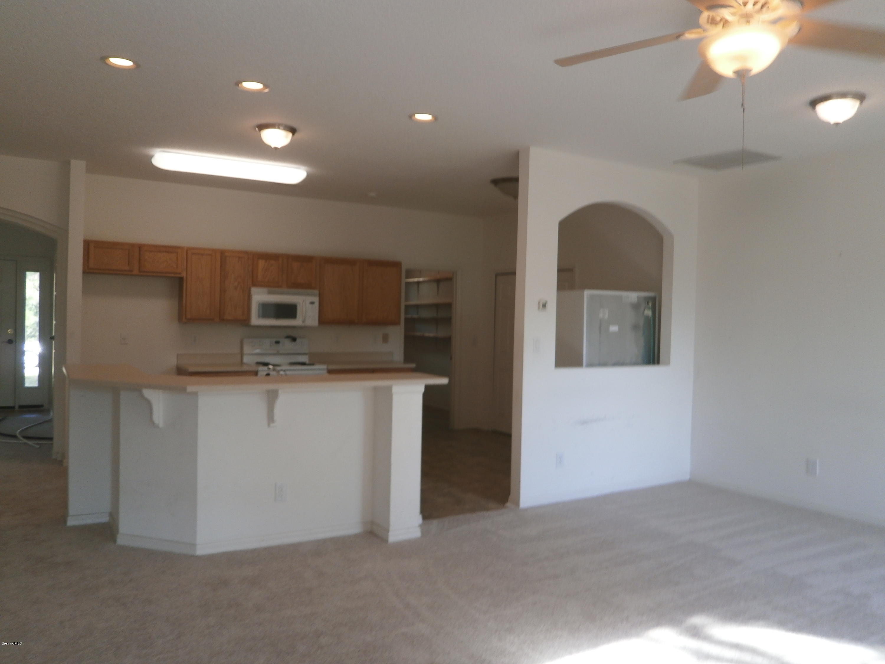 2784 Digby Road Southeast Palm Bay, FL 32909 - Photo 5 of 19 a view of a kitchen with a sink