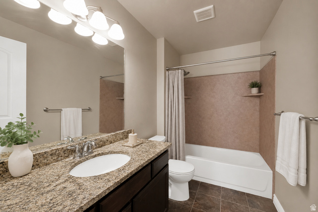 909 South Main Street, Unit G Layton, UT 84041 - Photo 17 of 25 Bathroom featuring a spacious vanity with a granite countertop, undermount sink, and chrome fixtures