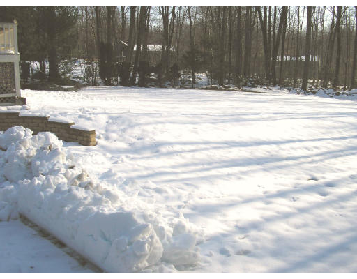 29 Acorn Road Northbridge, MA 01588 - Photo 3 of 9 a view of swimming pool with a yard in the background