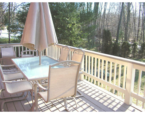 29 Acorn Road Northbridge, MA 01588 - Photo 9 of 9 a view of a chairs and table in the balcony
