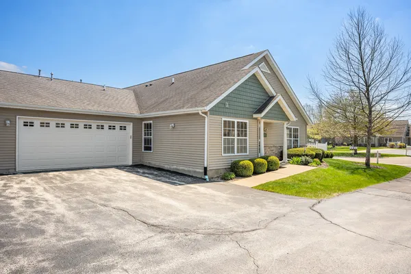 a view of a house with outdoor space and porch
