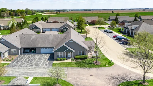 a aerial view of a house with garden