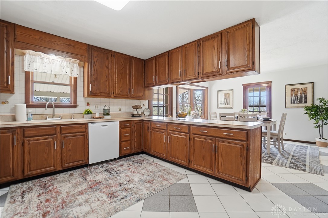 7553 Coffin Station Road Springfield, OH 45502 - Photo 51 of 95 This spacious kitchen with ample cabinetry provides a functional and inviting atmosphere.