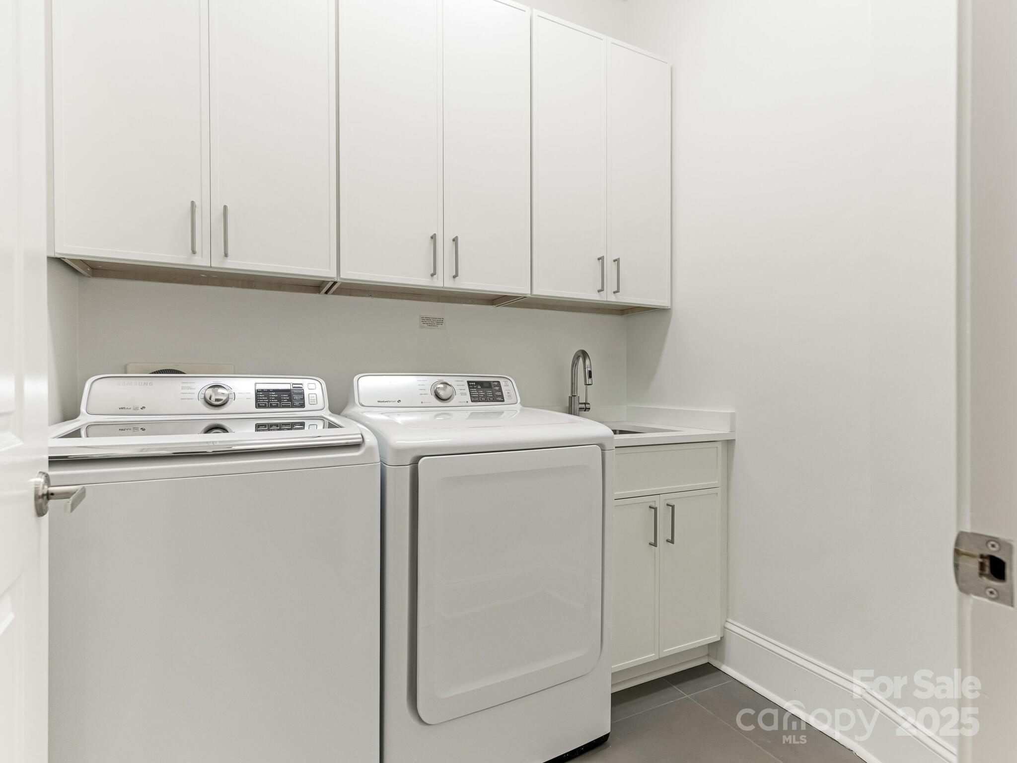 2823 Providence Road, Unit 152 Charlotte, NC 28211 - Photo 18 of 41 a utility room with dryer and washer
