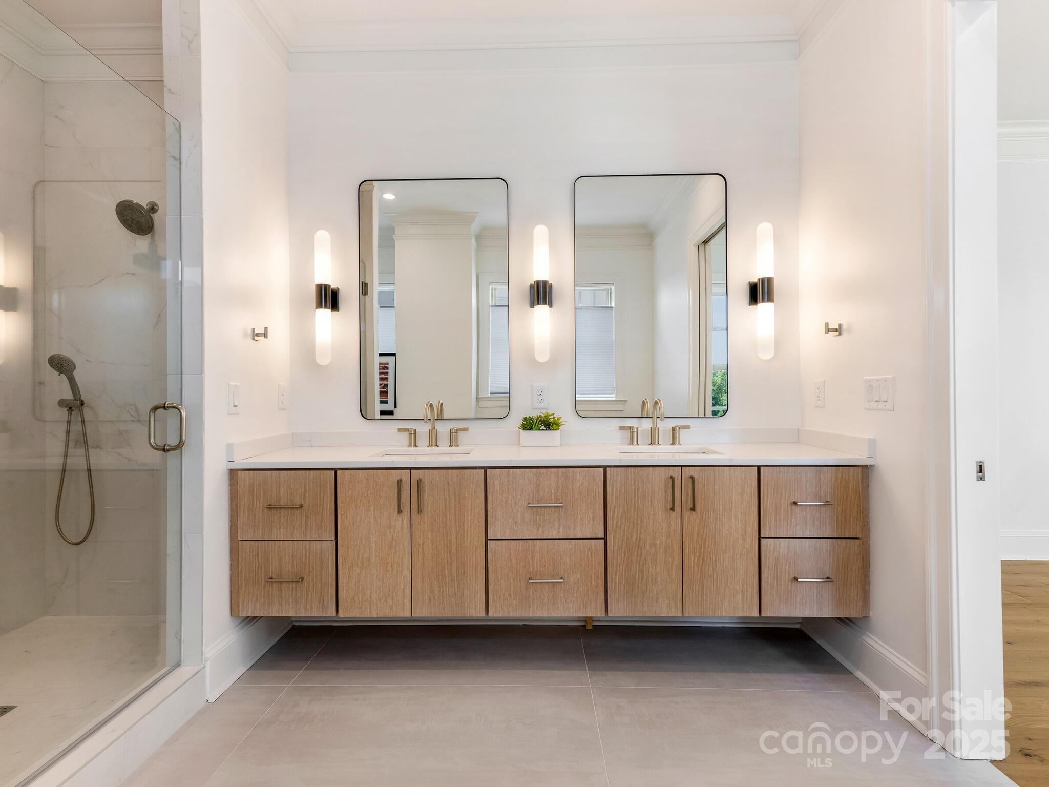 2823 Providence Road, Unit 152 Charlotte, NC 28211 - Photo 23 of 41 a spacious bathroom with double vanity sinks and a mirror