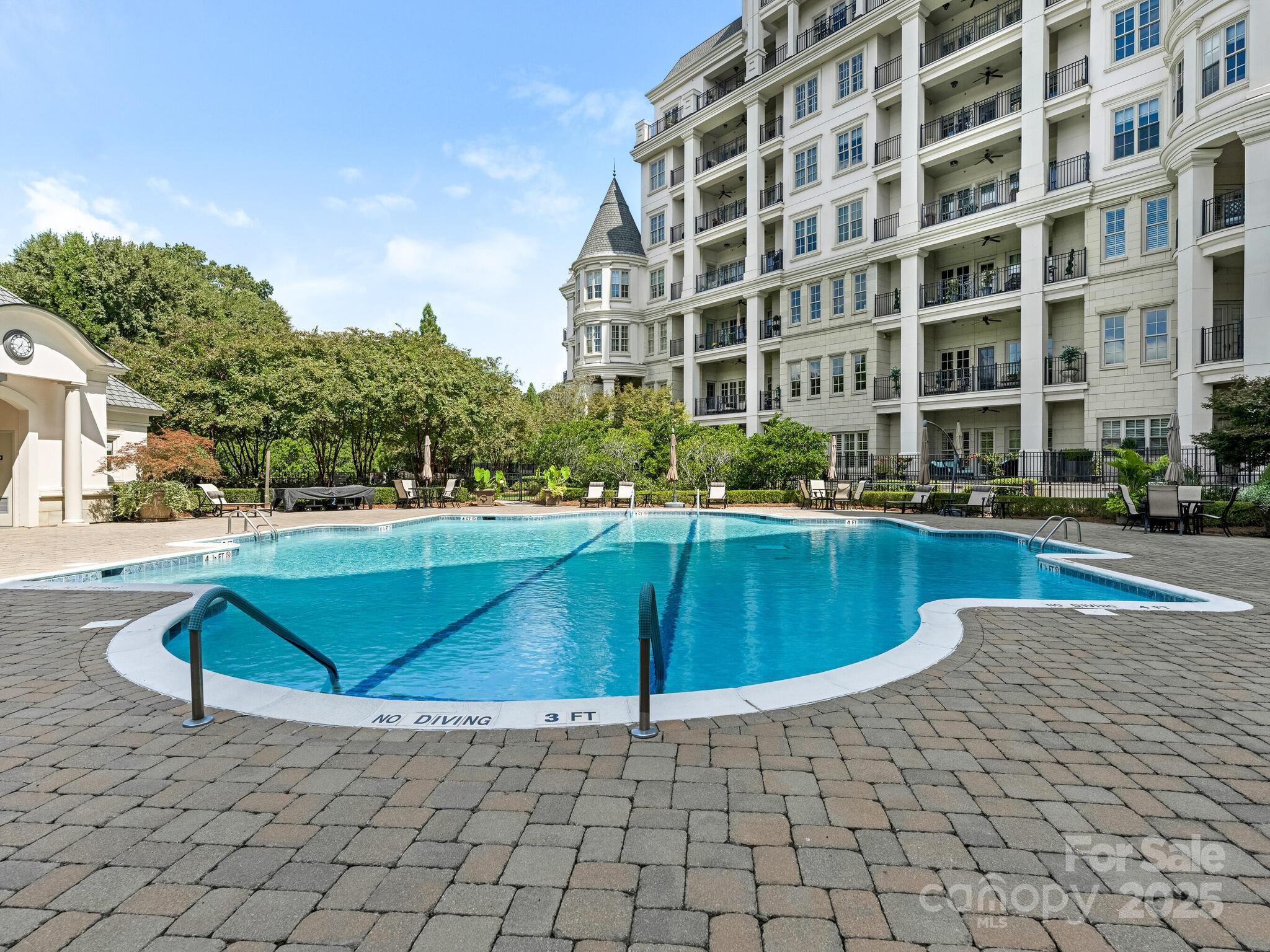 2823 Providence Road, Unit 152 Charlotte, NC 28211 - Photo 38 of 41 a view of a swimming pool and a buildings