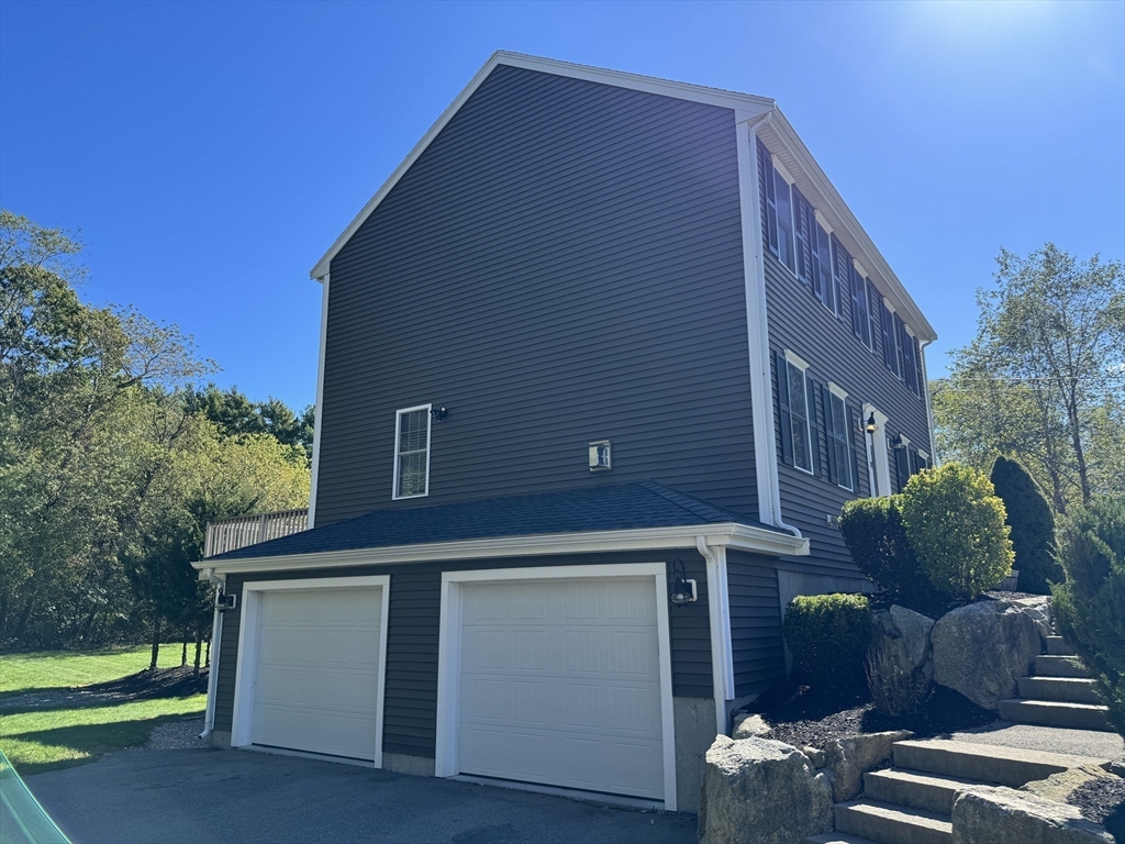 87 Center Street Carver, MA 02330 - Photo 2 of 42 a backyard of a house