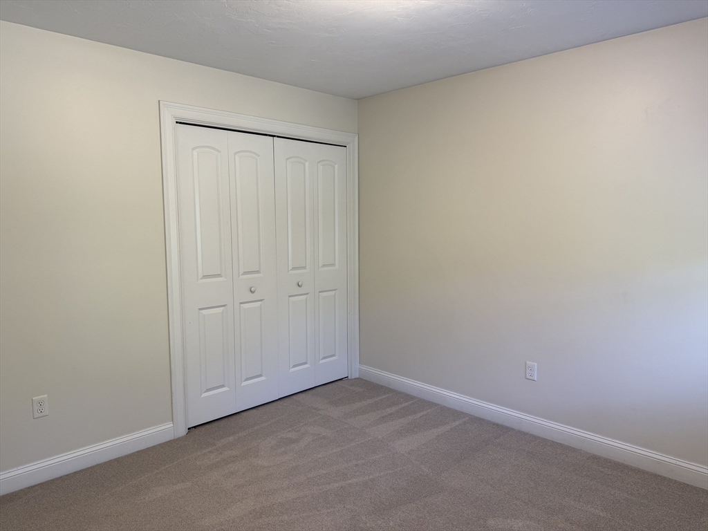 87 Center Street Carver, MA 02330 - Photo 26 of 42 a view of an empty room