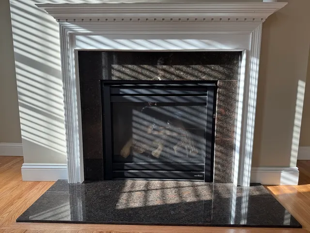 a view of fireplace in living room