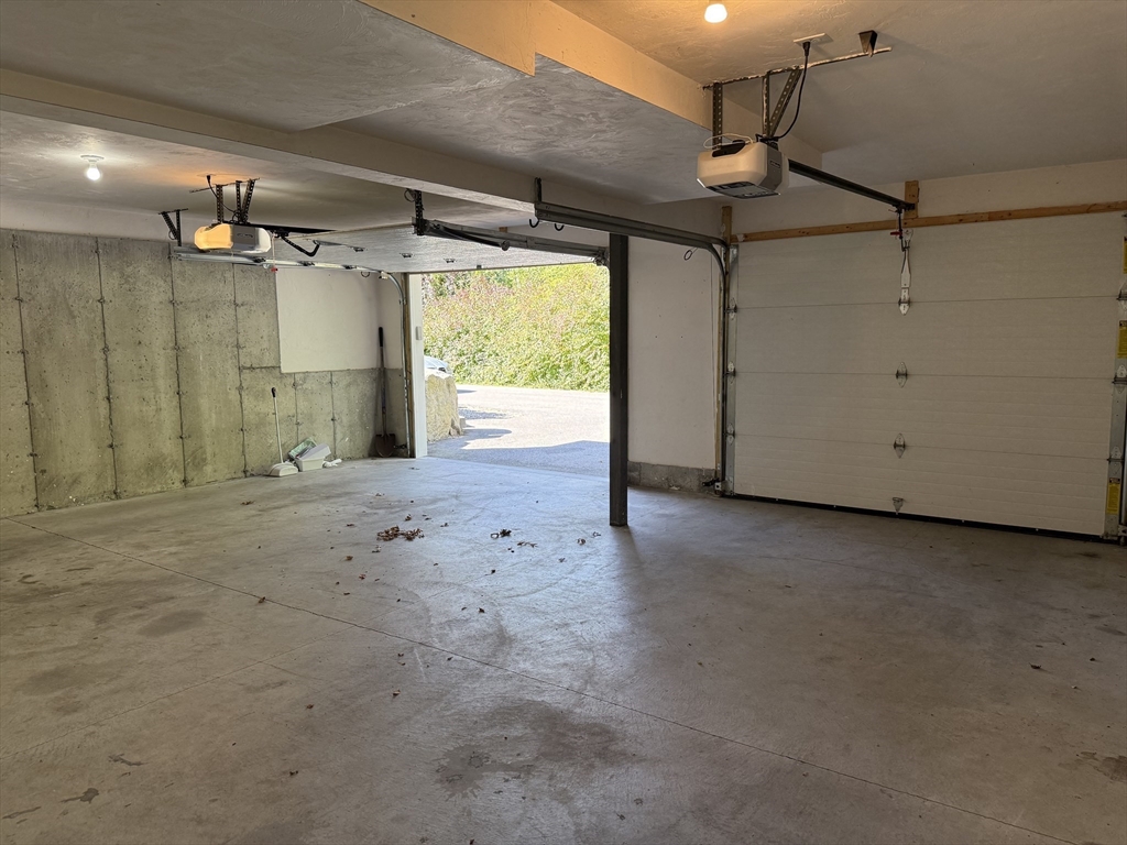 87 Center Street Carver, MA 02330 - Photo 28 of 42 a view of a garage