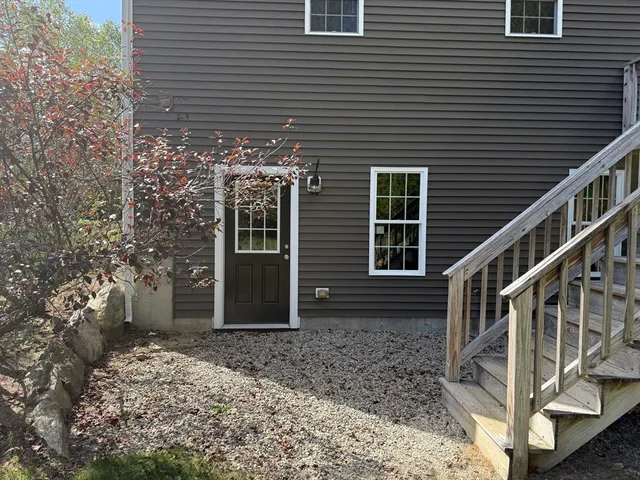 a front view of a house with deck
