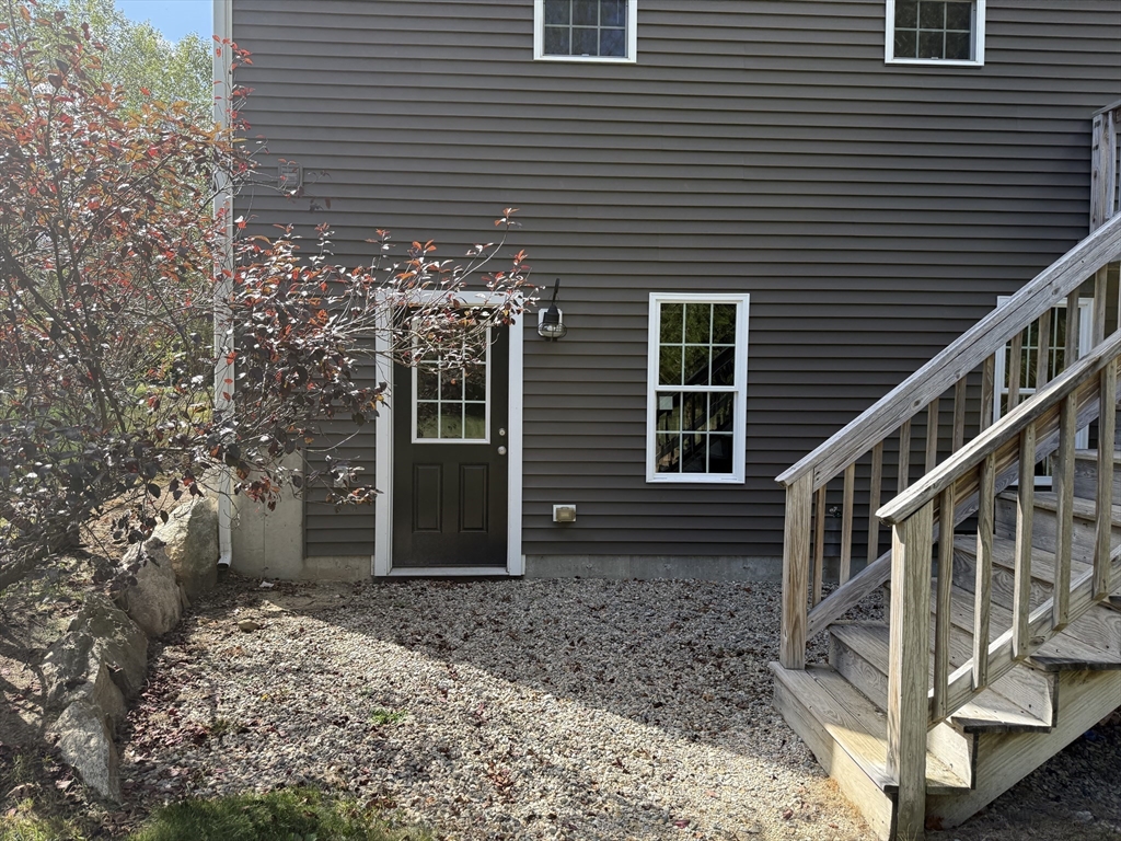 87 Center Street Carver, MA 02330 - Photo 4 of 42 a front view of a house with deck