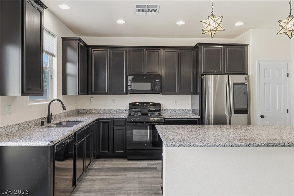 290 Cape Seville Place Henderson, NV 89015 - Photo 9 of 50 Generous counter space and recessed lighting.