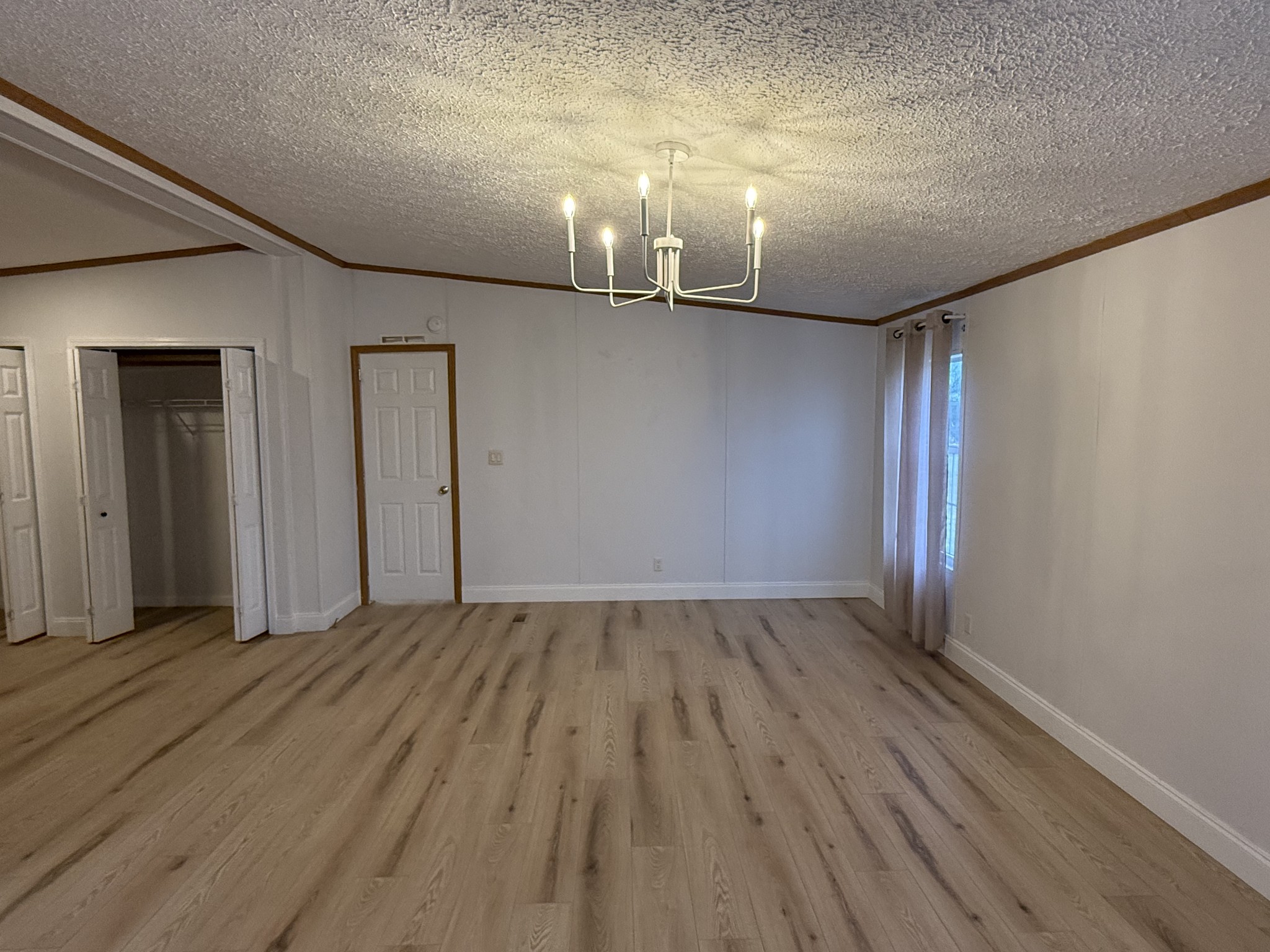 621 Cook Road Portland, TN 37148 - Photo 12 of 55 a view of empty room with wooden floor