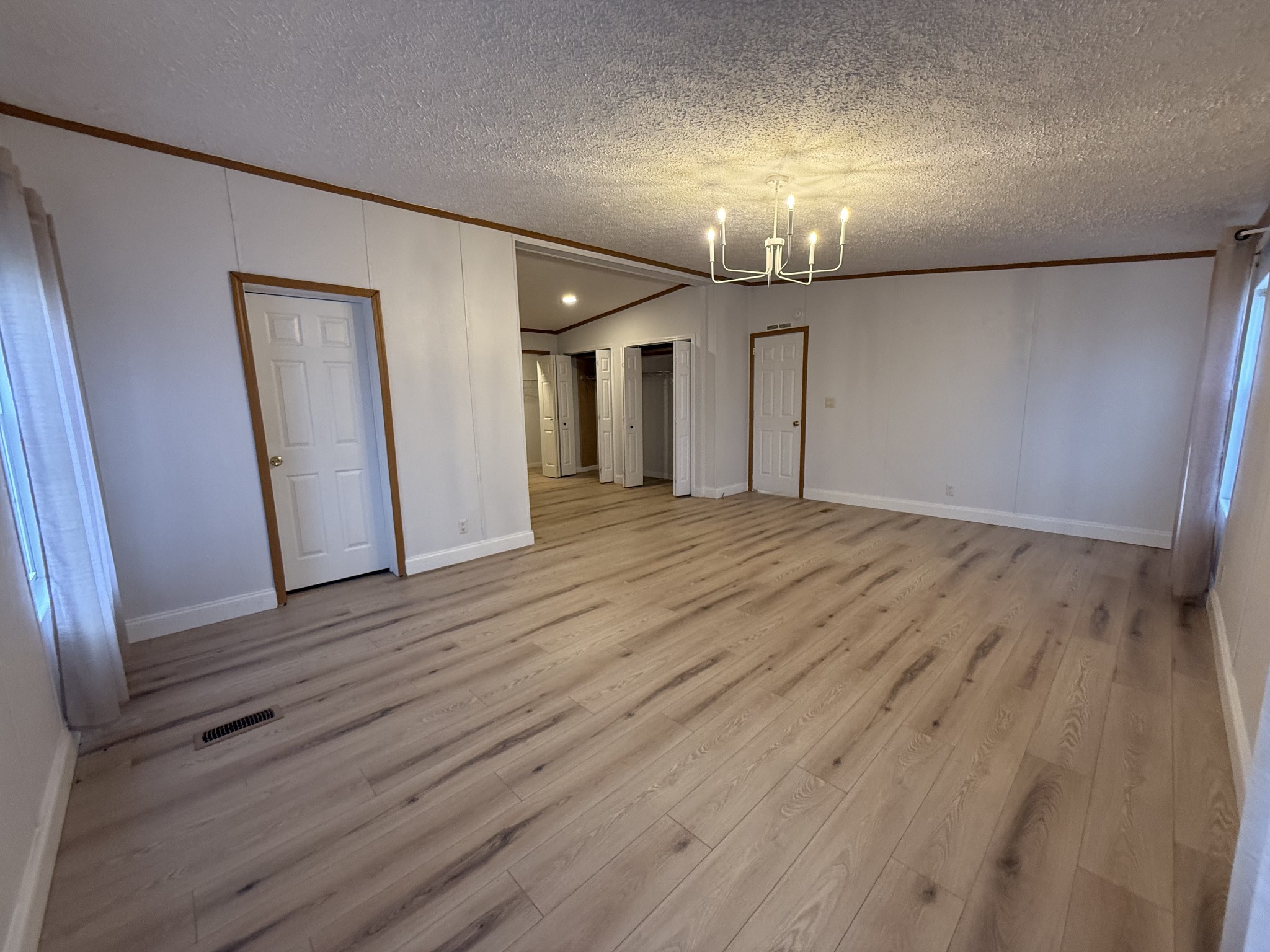 621 Cook Road Portland, TN 37148 - Photo 15 of 55 wooden floor in an empty room with a mirror