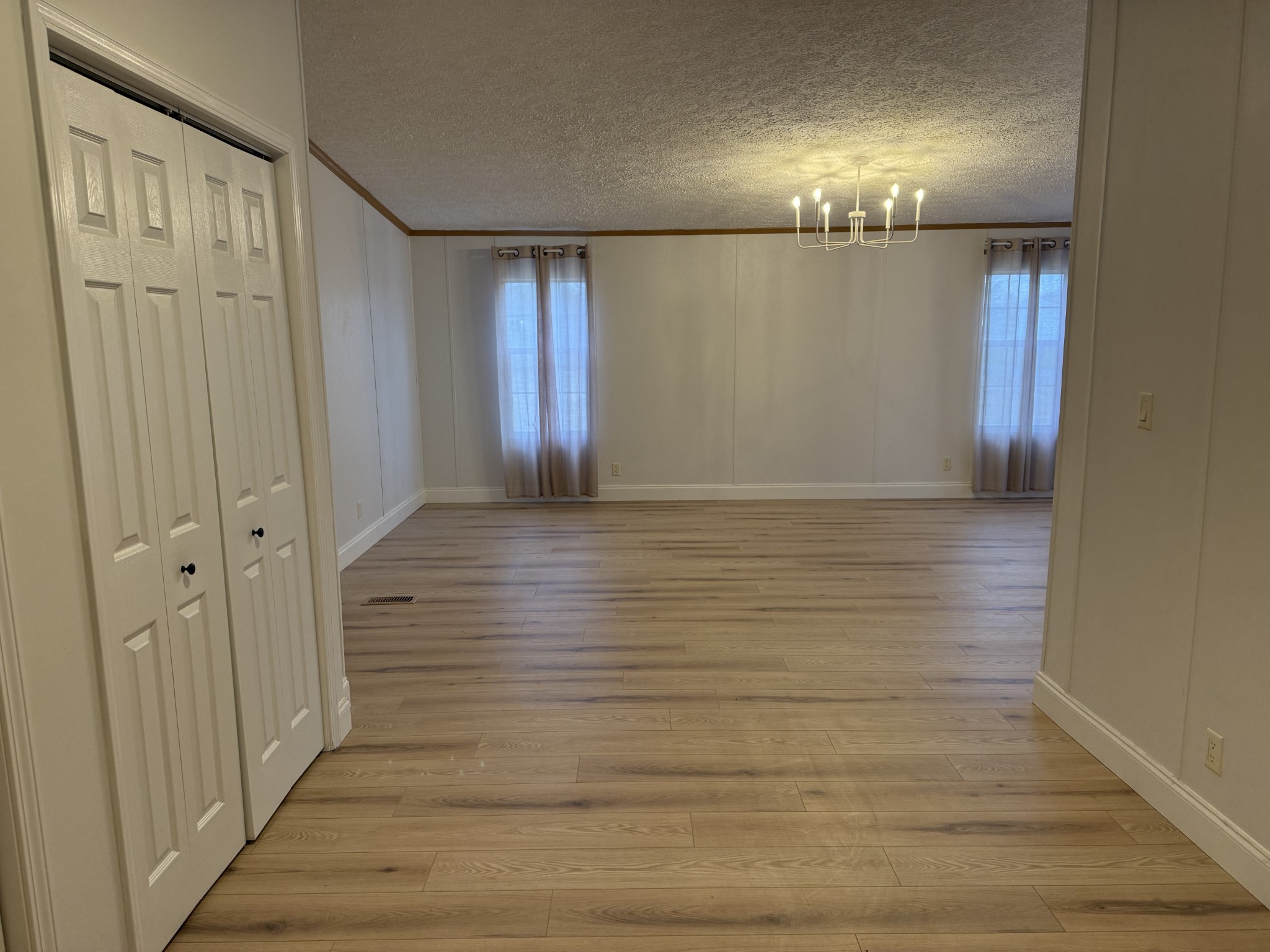 621 Cook Road Portland, TN 37148 - Photo 16 of 55 a view of a hallway with wooden floor