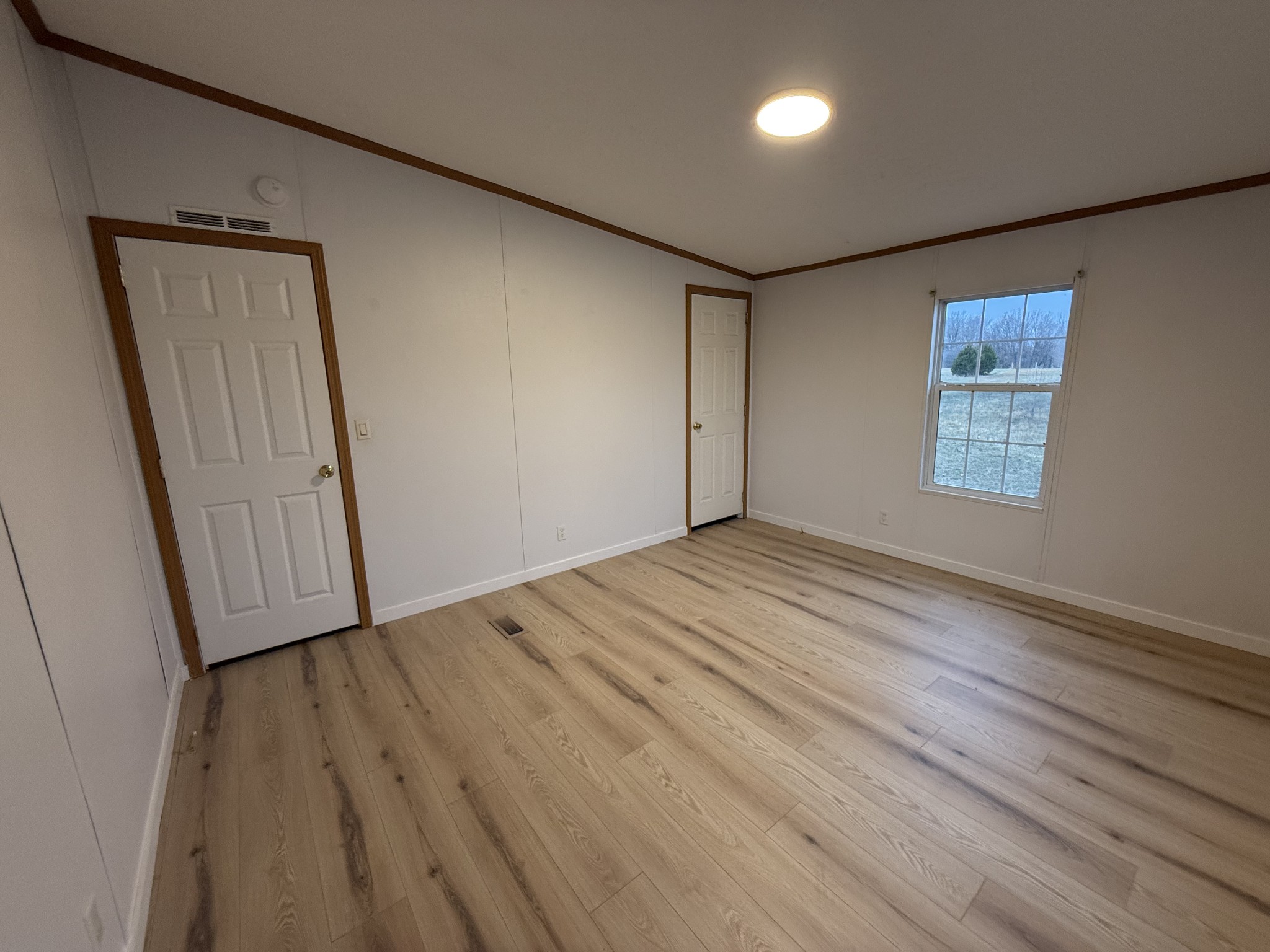 621 Cook Road Portland, TN 37148 - Photo 28 of 55 a view of empty room with wooden floor