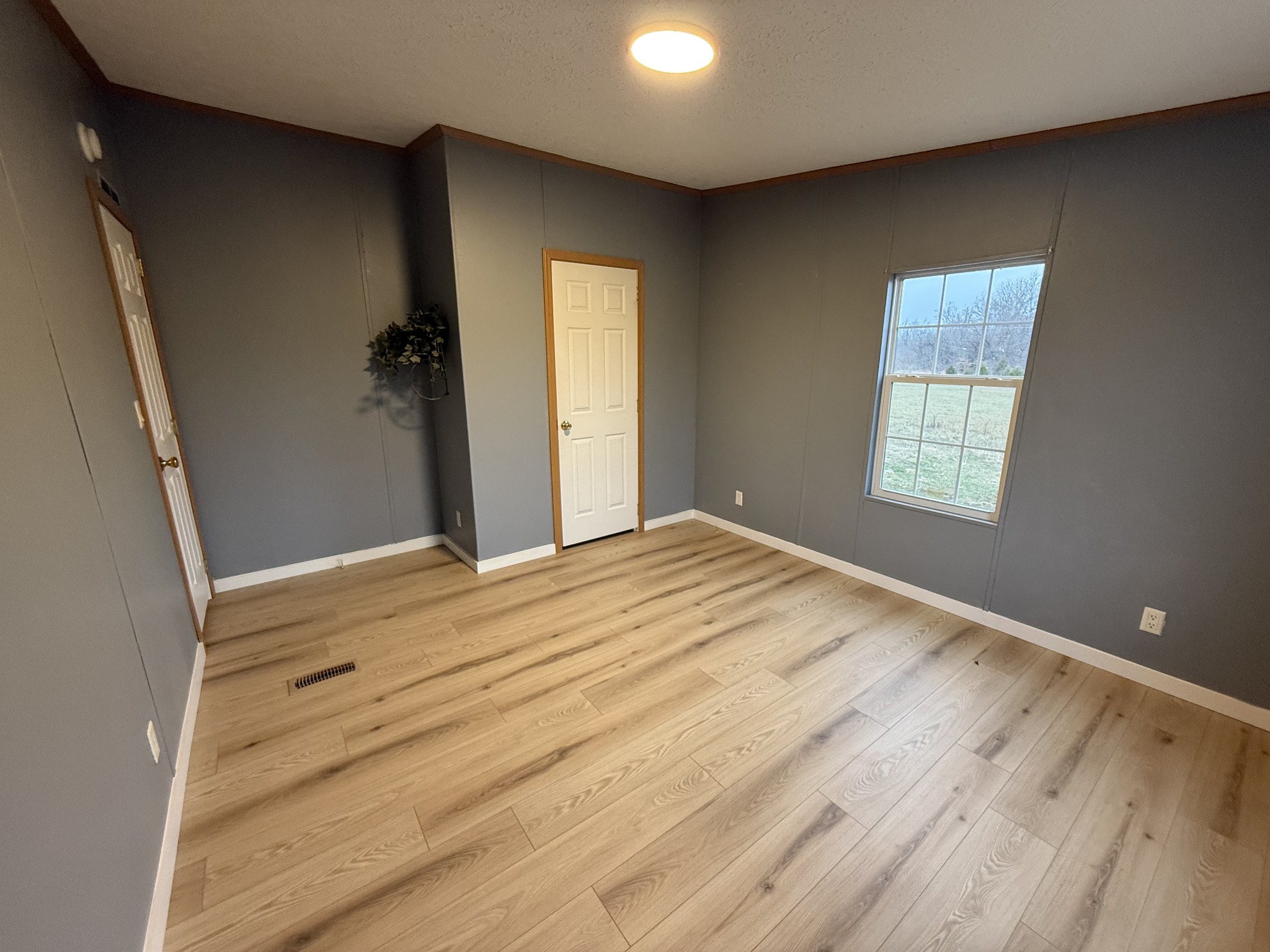 621 Cook Road Portland, TN 37148 - Photo 33 of 55 a bedroom with a bed and a window