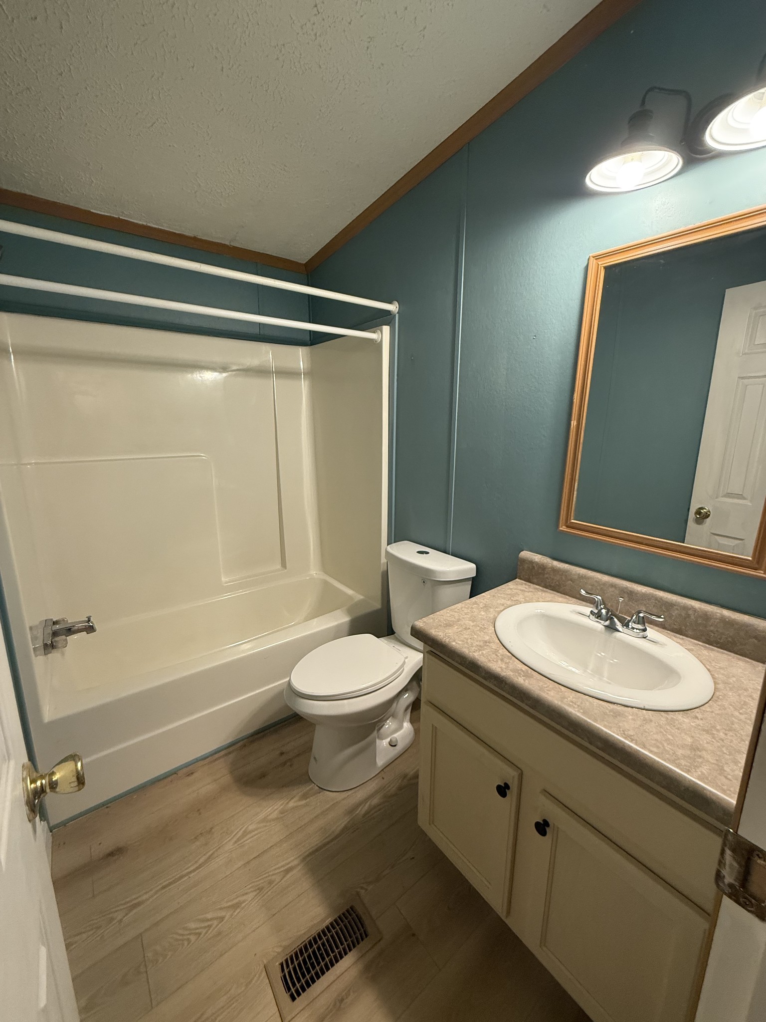 621 Cook Road Portland, TN 37148 - Photo 34 of 55 a bathroom with a granite countertop toilet sink and mirror