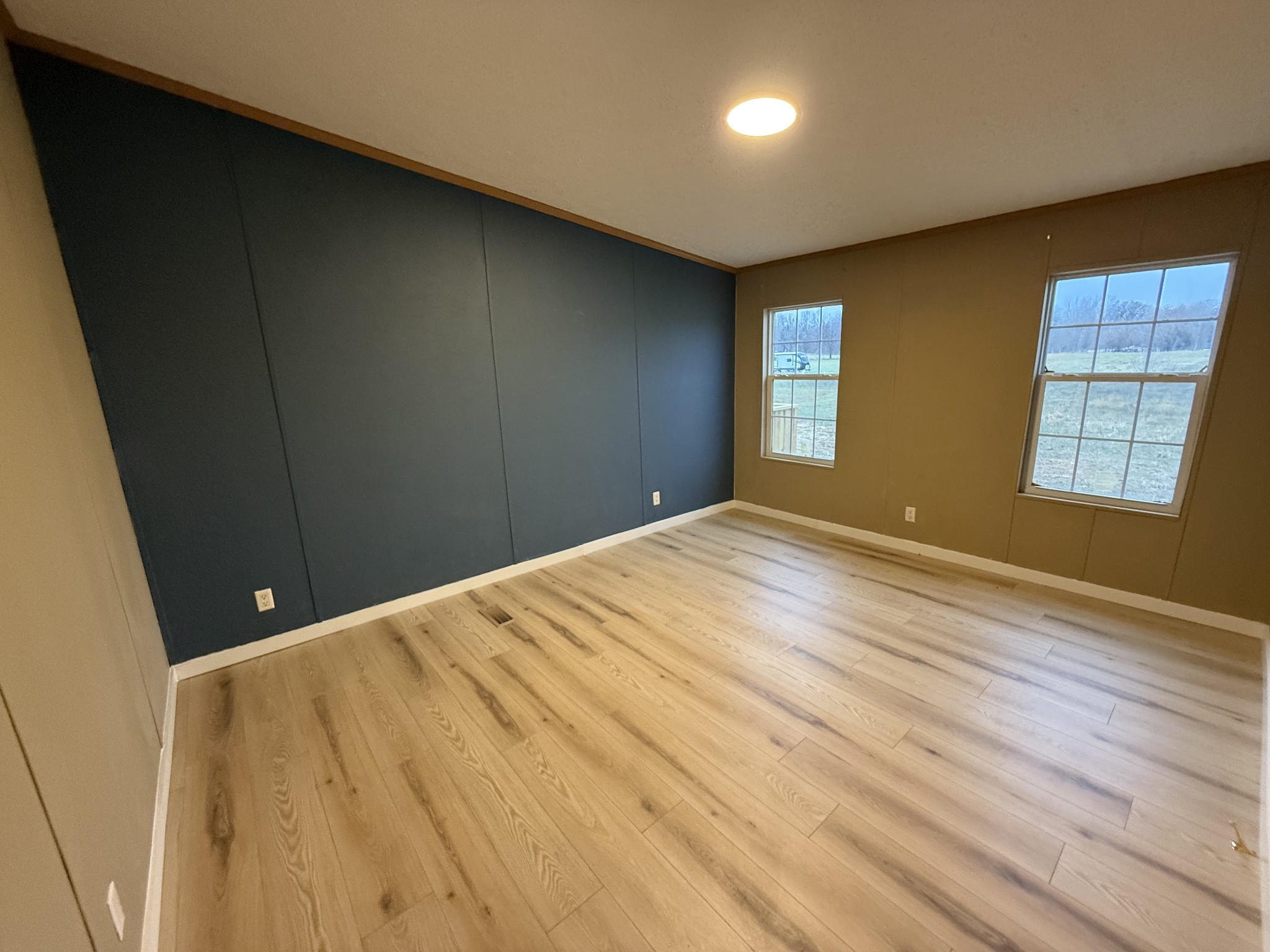 621 Cook Road Portland, TN 37148 - Photo 38 of 55 a view of empty room with wooden floor and fan