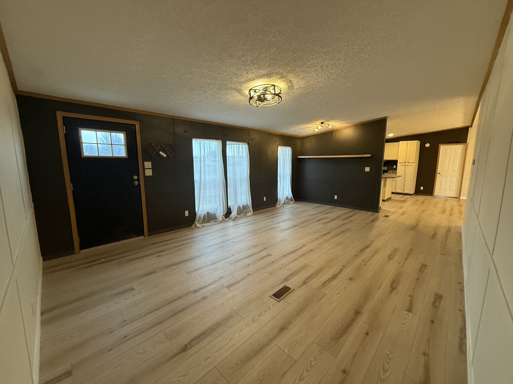 621 Cook Road Portland, TN 37148 - Photo 4 of 55 a view of a hallway with wooden floor