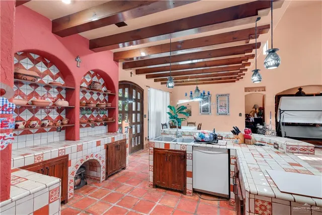 a room with granite countertop furniture and a fireplace