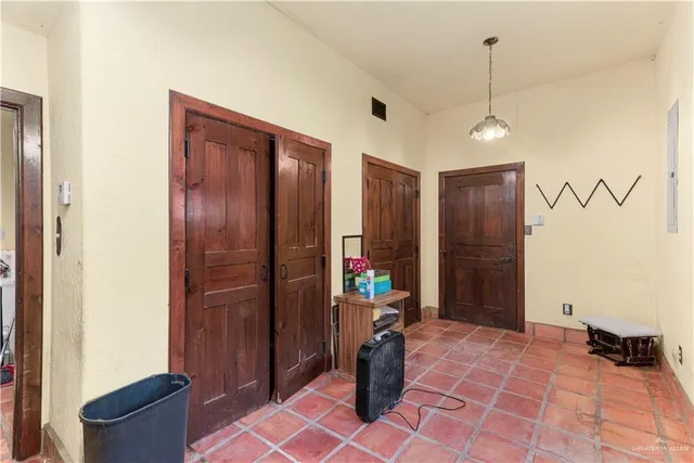 a kitchen that has a sink and cabinets