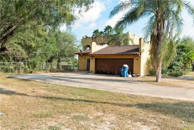 a view of a living room and a yard